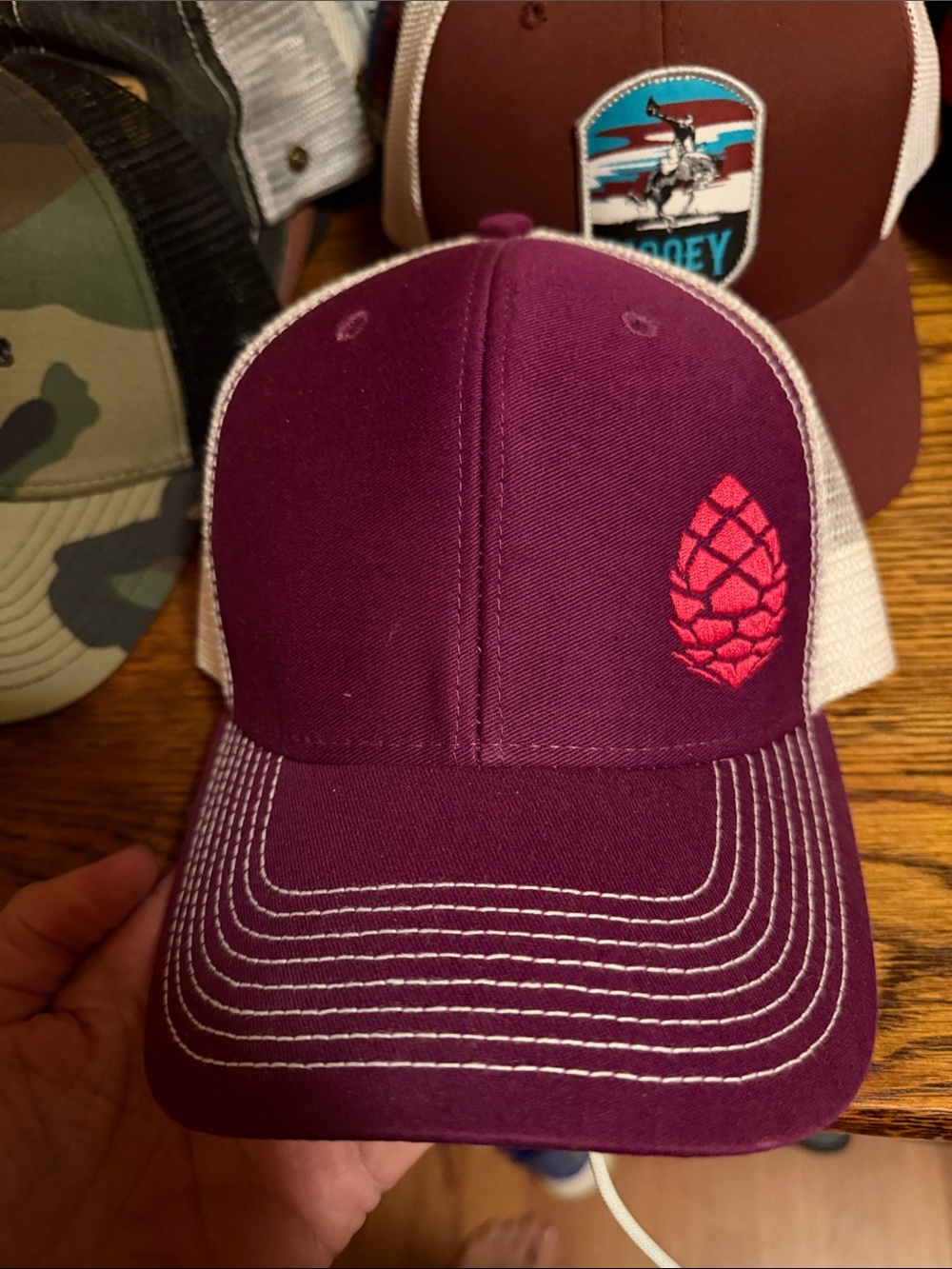 Women's Maroon Trucker Hat with Pink Pinecone Accent